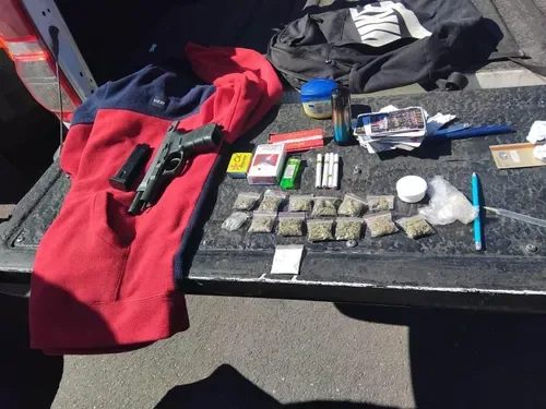 Gun, drugs, alcohol found in school raids