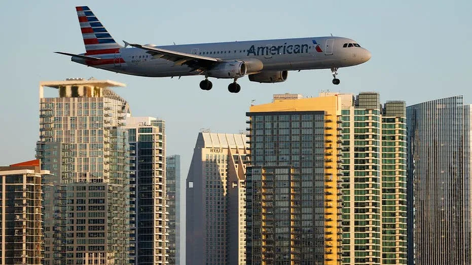American Airlines flight lands safely after laptop battery catches fire on board; passenger injured
