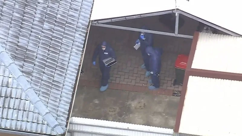 Man arrested after body of twin brother found