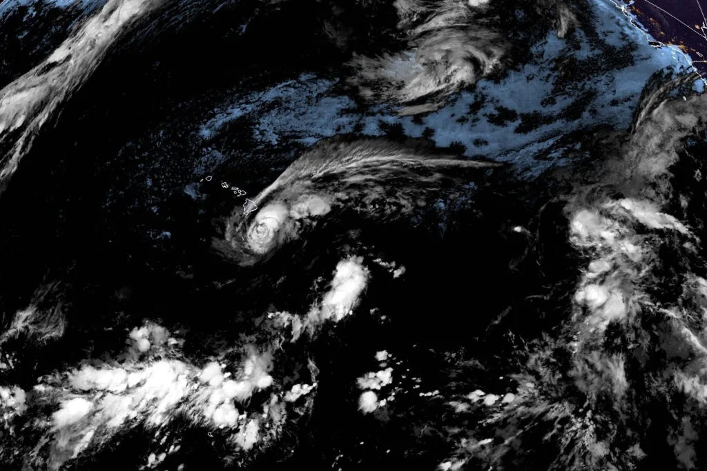 Lala is again a tropical storm, sending drenching rain and winds across the Hawaiian islands