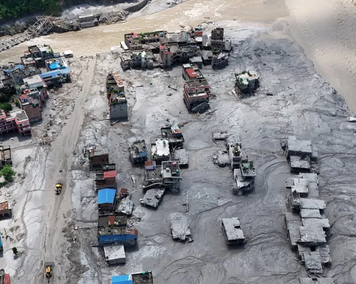 Race to get aid into Nepal and Tibet amid warnings flood lake could burst