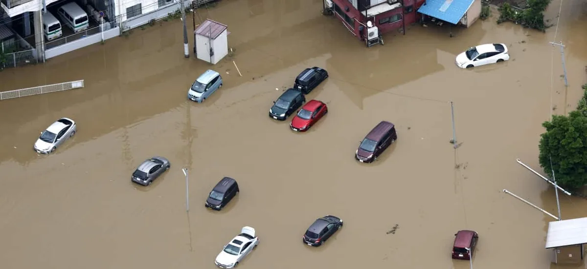 Deluge at Tokyo airport kills four and strands 7,000 as Hawaii braces for tropical storm