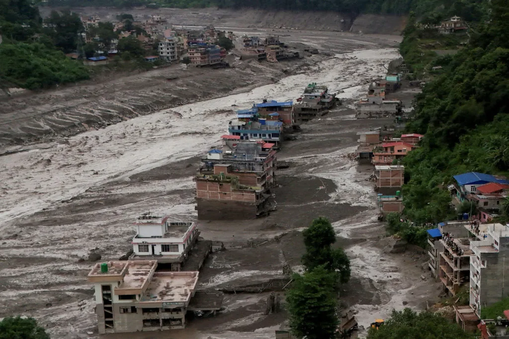 At least 22 killed and hundreds missing after avalanche triggers deadly flash floods in Nepal