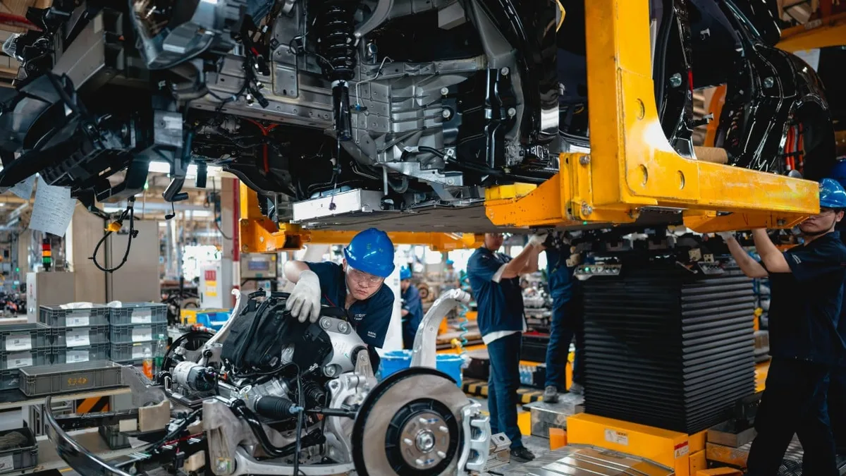 China tells carmakers, suppliers to avoid price wars abroad to pave way for healthy growth