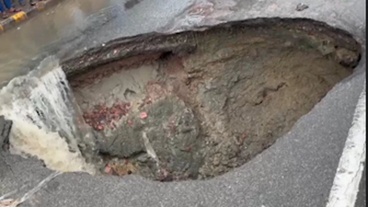 Watch: Road caves in after heavy rains in Kanpur’s Jajmau, forms 18 foot deep crater