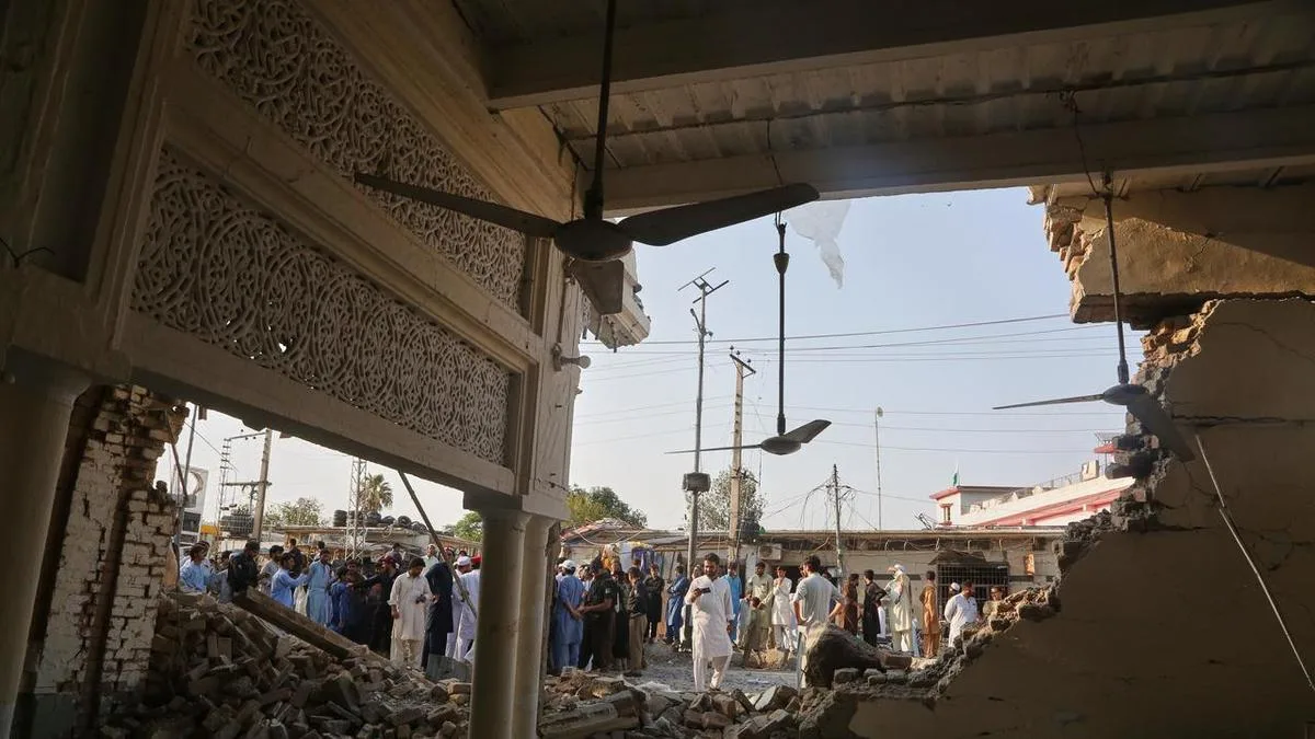 Pakistan mosque bombing near police office kills 21