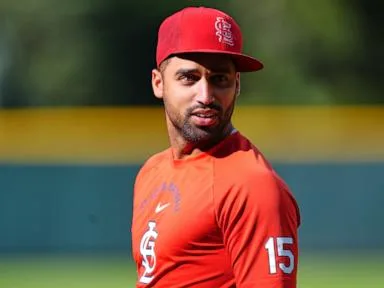 Cardinals, Rockies players tilt caps a day after umpire Eddings' comments to St. Louis rookie