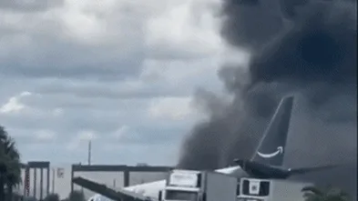 Five killed as Amazon plane overruns runway, hitting vehicles and bursting into flames