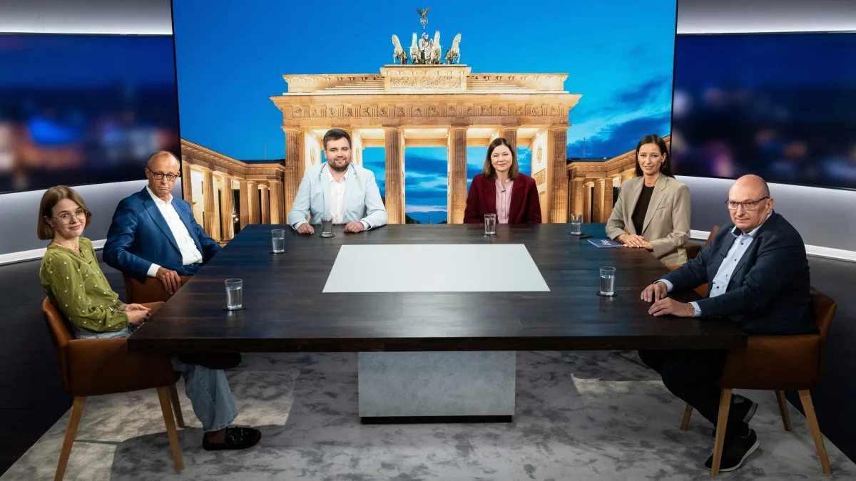 Kritik nach Merz-Auftritt: „Sehen Sie uns ‚Nutznießern‘ dabei zu, wie wir Menschenleben retten“