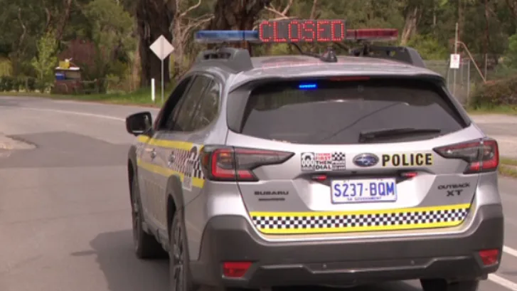 Cyclist freed from beneath four-wheel drive after becoming trapped in crash on Adelaide Hills road