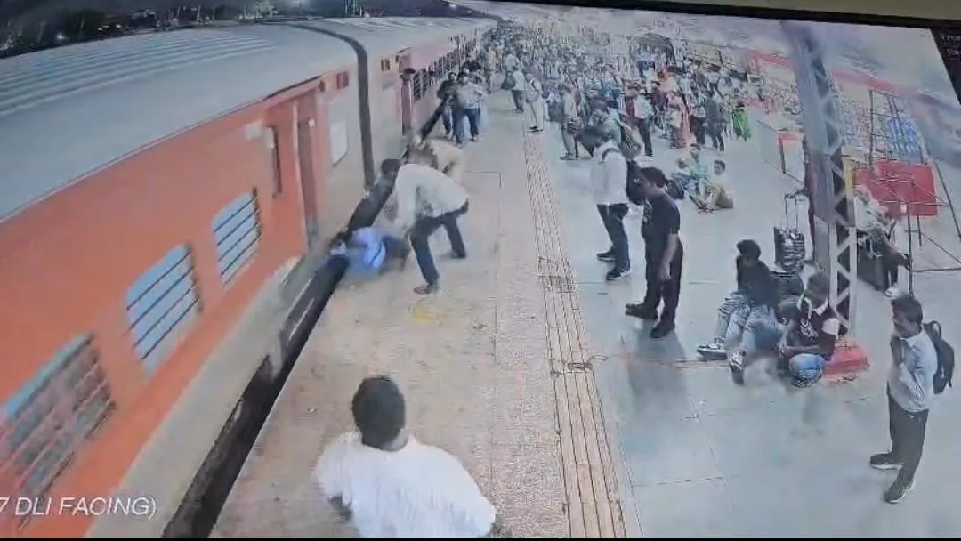 Sabarmati Express passenger dragged 50m alongside moving train after fall at Agra station in India