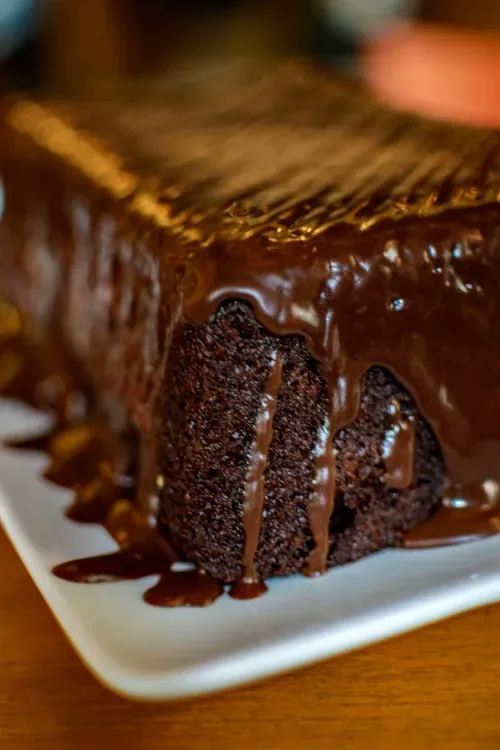 Rich chocolate loaf cake with a silky chocolate ganache
