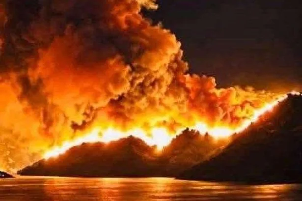 UK couple trapped in sea waiting for rescue as huge fire tore through resort