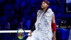 A newspaper gown and an NBA tribute - Osaka's US Open fashion statement