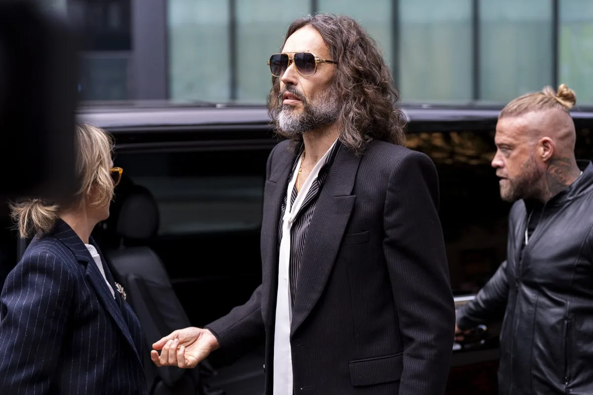 Russell Brand ‘apologised for treating woman like an animal’, court hears