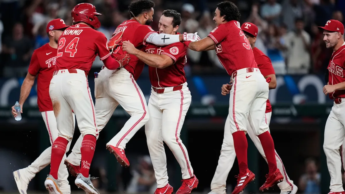 Scoreless through 9, Rangers beat Angels 2-1 as Langford has tying RBI then scores winner in 10th
