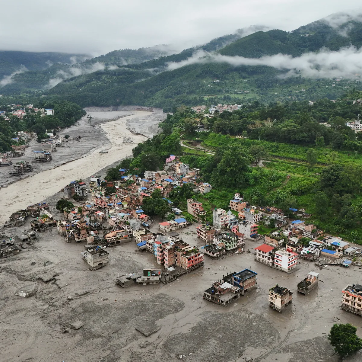 Photos: A Deadly Flood Tears Through Nepal and Tibet