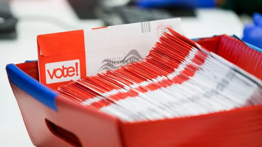 DOJ asks judge to lift nationwide block on mail-in voting restrictions