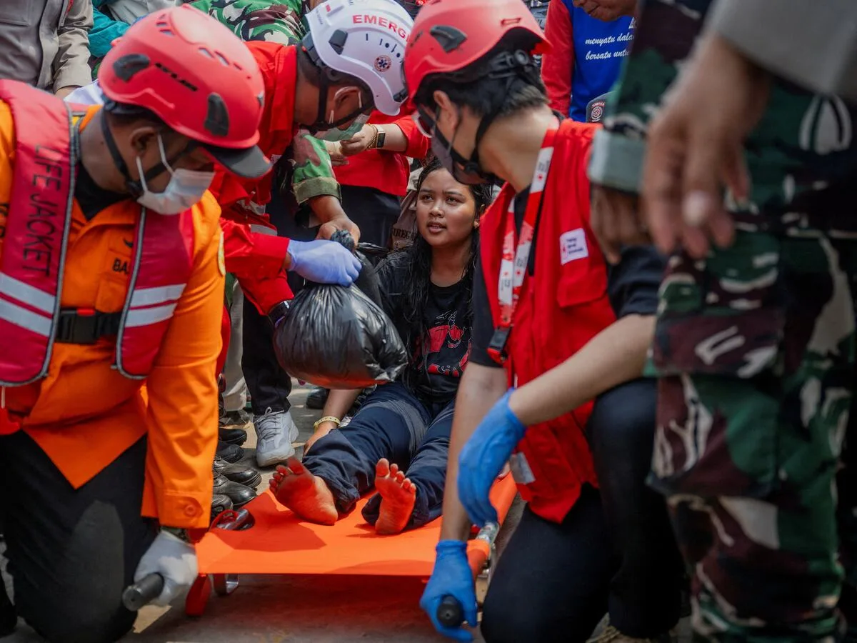 Families desperate as 129 still missing four days after ship capsized in Indonesia’s Java Sea