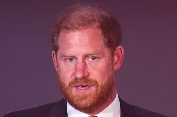 Prince Harry fights back tears as he talks about family at prize-giving ceremony