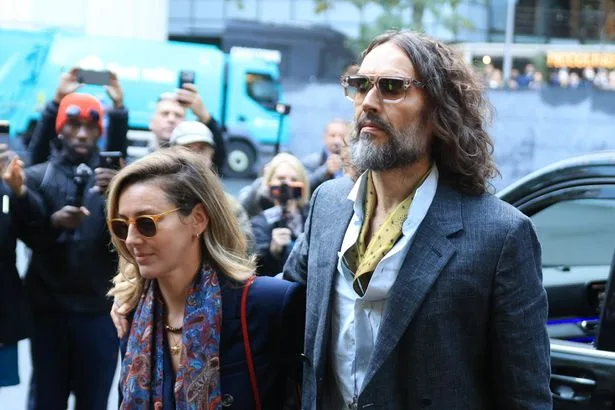 Russell Brand arrives at court for rape trial with third complainant expected to give evidence