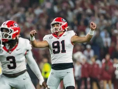 Dwight Phillips Jr. and No. 2 Georgia run past No. 6 Alabama 20-17 in an SEC clash