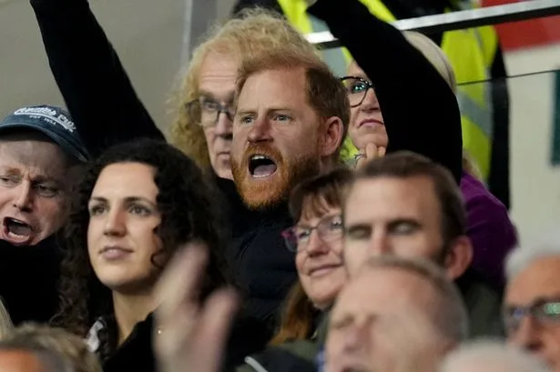 Prince Harry booed as he's spotted at Leicester Tigers game holding beer