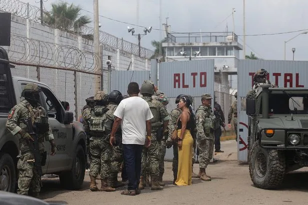 Innocent toddler dies in prison brawl as inmates open fire during visiting hours
