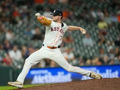 Pecko fans 4 in MLB debut, Vázquez hits 7th homer as the Astros beat the Angels 3-2