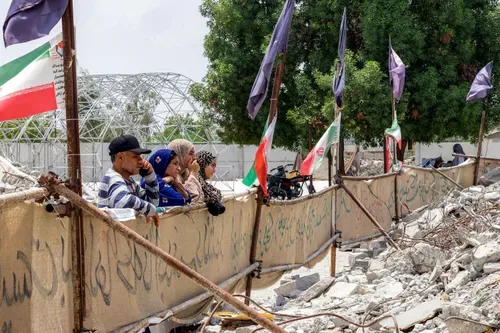 Six months on, grief still raw for Iran school parents