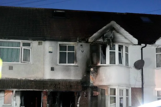 Man arrested on suspicion of murder after house fire in Hounslow leaves one dead and eight injured