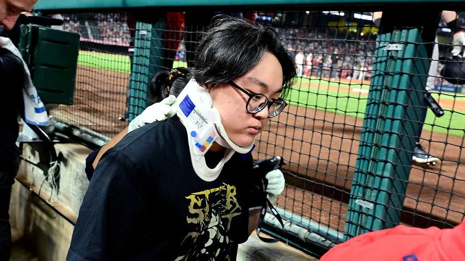 Photographer hit in head with hard foul ball at Yankees-Angels game, carted off in scary scene