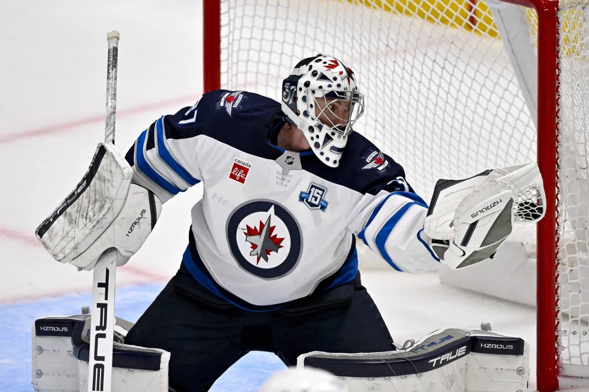 Jets star Connor Hellebuyck goes public with trade request
