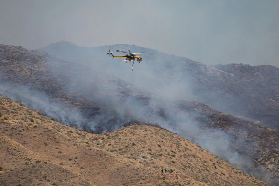 90,000 Told To Evacuate As Reno Fire Spreads Into City