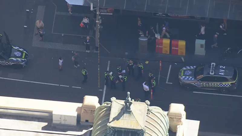 Teen charged after car hits woman close to Melbourne marathon site