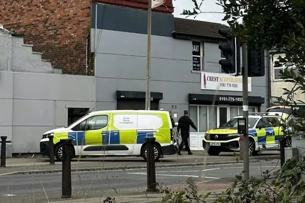 Gun and ammunition found at Greater Manchester nursery as two men arrested