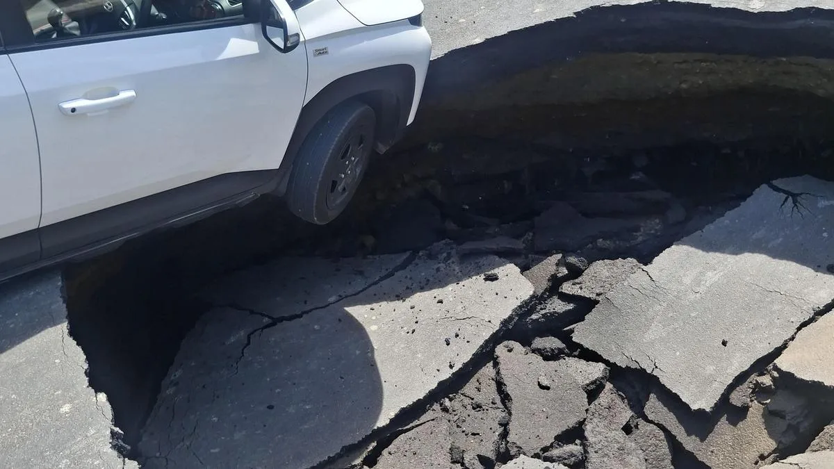 Car falls into sinkhole as road caves in near Chennai’s Tidel Park