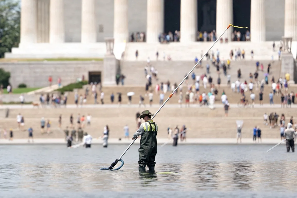 Trump insists work on Reflecting Pool is complete - despite workers still at the site