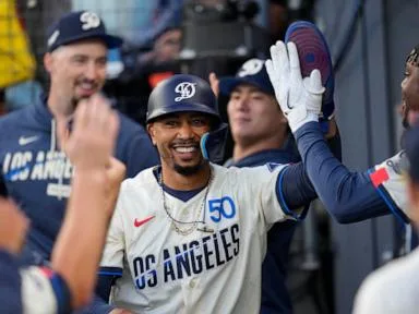 Dodgers outslug Giants 10-4, led by Mookie Betts with four hits