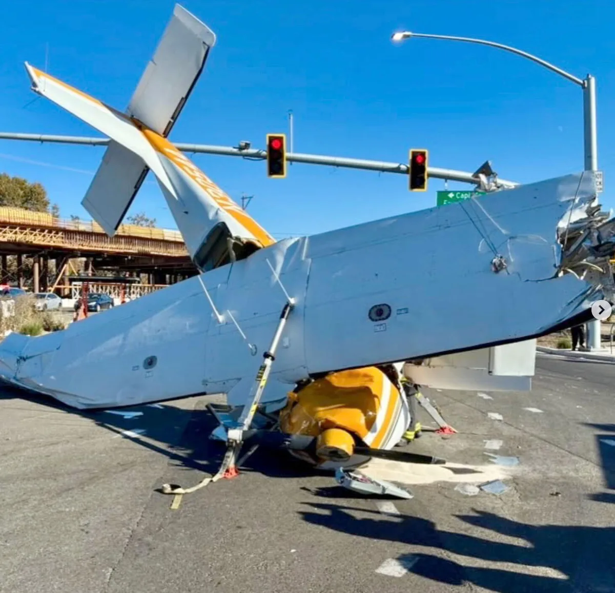 Airplane crushed after nosediving onto California street. Somehow, 2 adults and a child survive