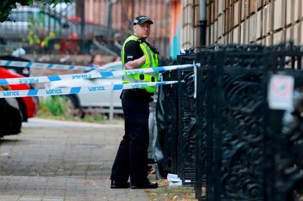 Glasgow double murder probe after two found dead and police launch manhunt