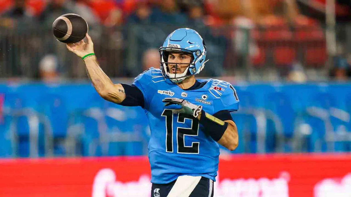 Kelly throws three TDs as Argonauts earn wild-weather win over Tiger-cats