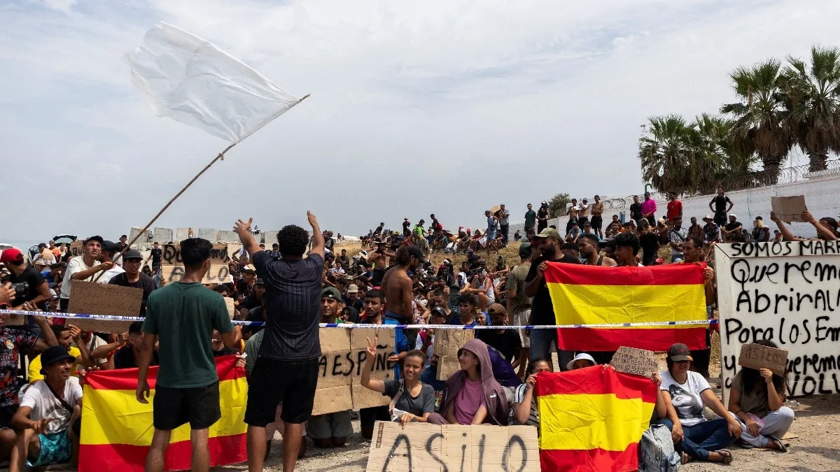 Don't send us back: Hundreds of migrants seek asylum in Spain's Ceuta enclave
