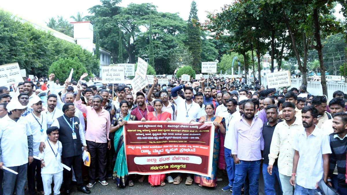 Outsourced workers of Health Department stage protest in Hassan demanding implementation of revised minimum wage