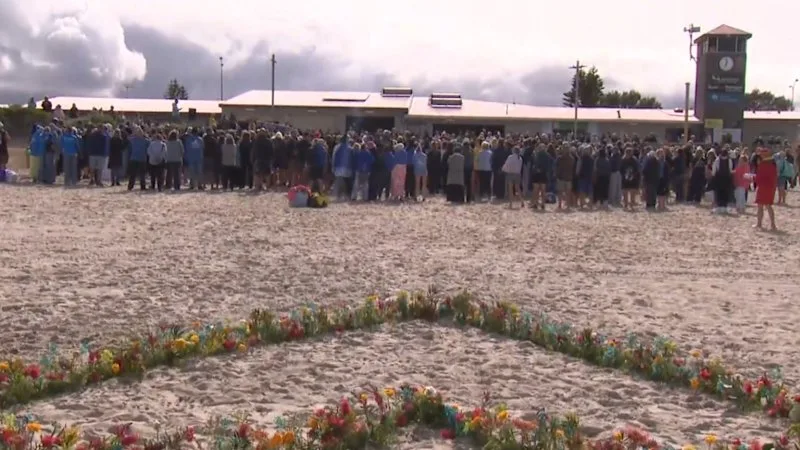 Tribute held for Perth shark attack victim