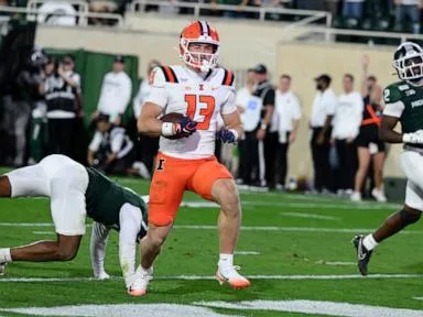 Illinois makes a stop on Michigan State's 2-point conversion attempt in OT, holds on for 38-37 win
