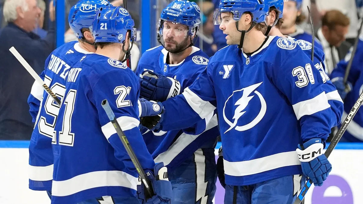Lightning storm back from 2-goal deficit to beat the Canucks 4-2