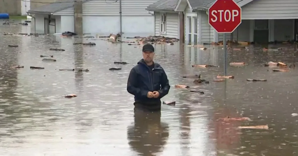 Dozens need rescuing in Indiana as streets turn to rivers amid flooding emergency