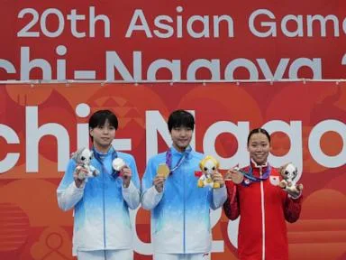 Chinese 13-year-old Yu Zidi starts quickly in the pool at the Asian Games