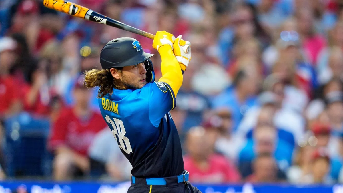 Bohm's triple in the 10th scores 2 runs as the Phillies beat the Cardinals 7-6